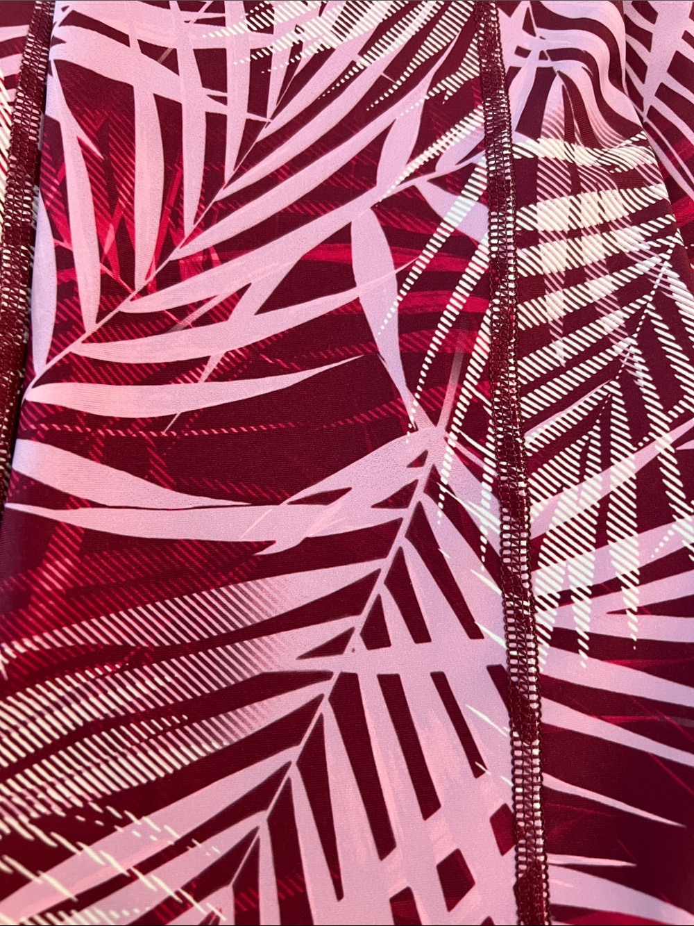 Double pocketed Tek Gear Pink and Burgundy Palm-Print Capri yoga pants - Picture 7 of 7